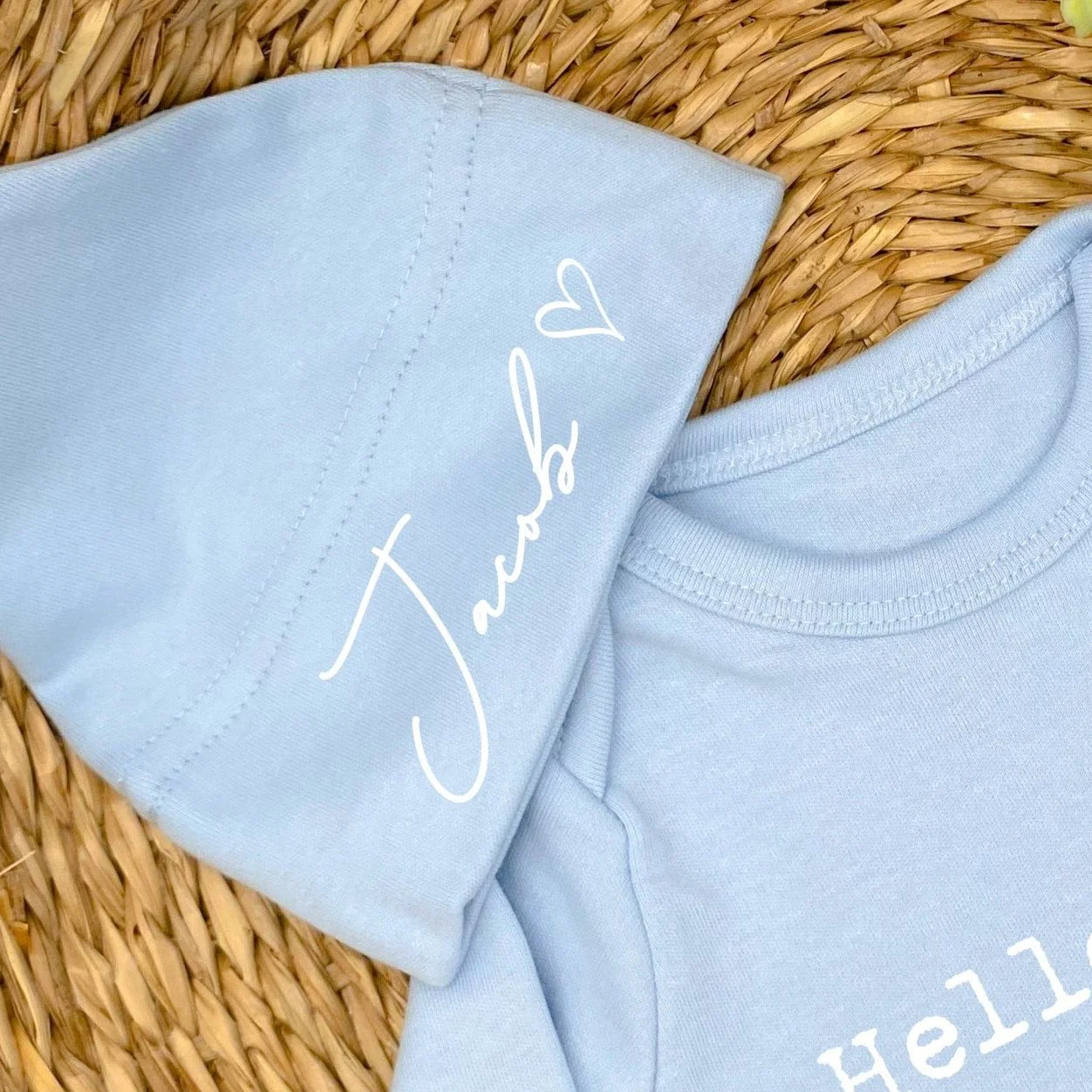 Personalised Blue Script Hello World Babygrow With Optional Matching Accessories - Image 4